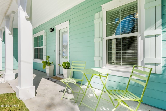 view of patio featuring a porch