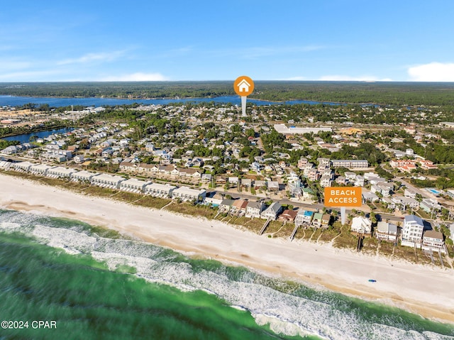 aerial view featuring a water view and a view of the beach