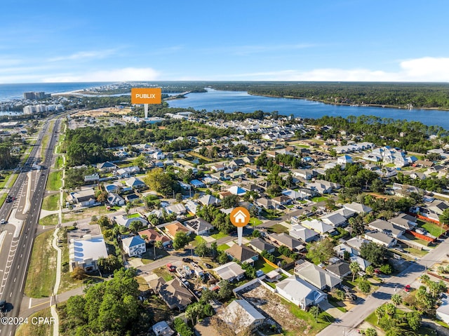 bird's eye view with a water view