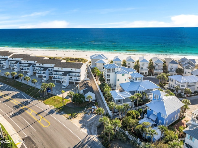 aerial view with a view of the beach and a water view