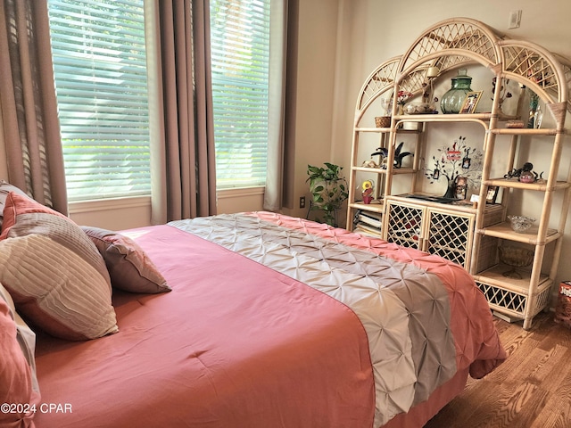 bedroom featuring hardwood / wood-style flooring