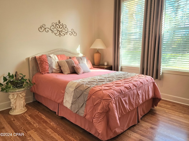 bedroom featuring wood-type flooring