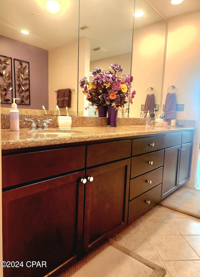 bathroom featuring vanity and tile patterned floors