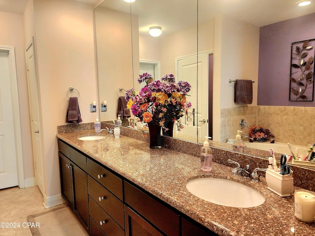 bathroom featuring tile patterned floors and vanity