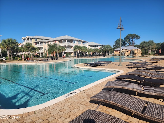 view of swimming pool with a patio area