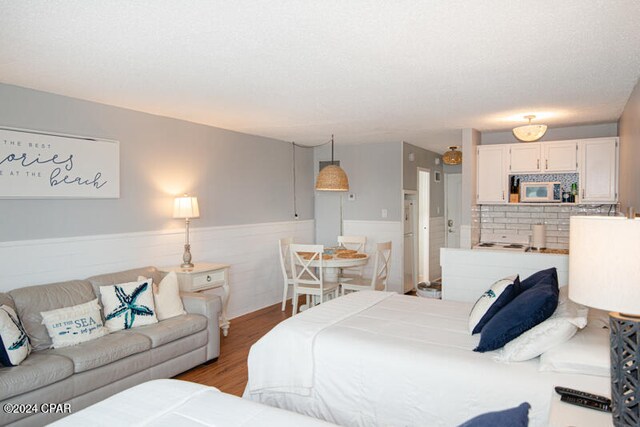 bedroom with light wood-type flooring