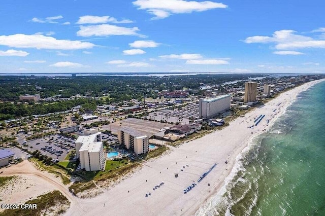 drone / aerial view with a view of the beach and a water view