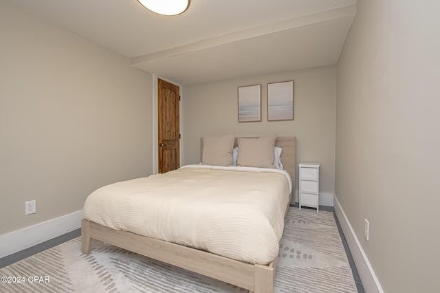 bedroom featuring baseboards