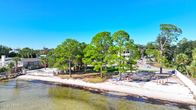 view of home's community featuring a water view