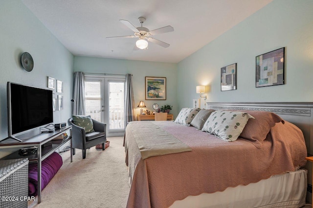 bedroom with light carpet, french doors, access to outside, and ceiling fan