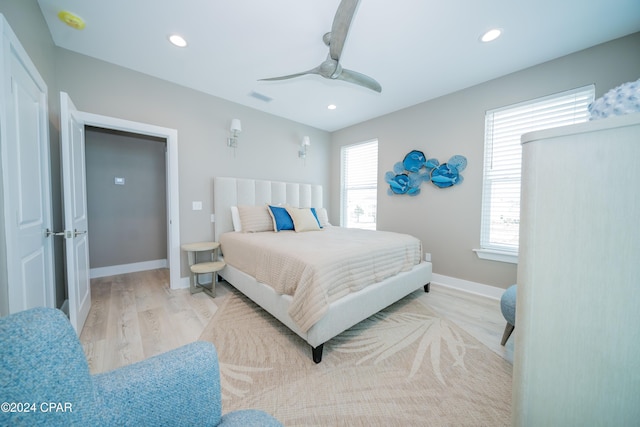 111 31st St Unit A & B, Mexico Beach, FL 32456 - bedroom with light hardwood / wood-style flooring and ceiling fan