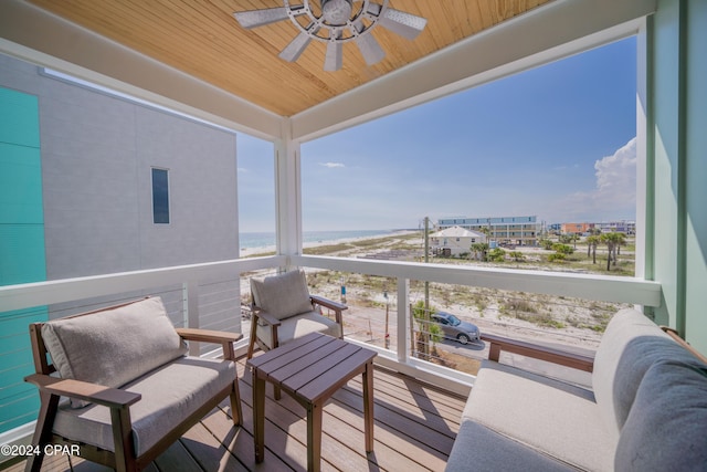 111 31st St Unit A & B, Mexico Beach, FL 32456 - balcony with ceiling fan and a water view