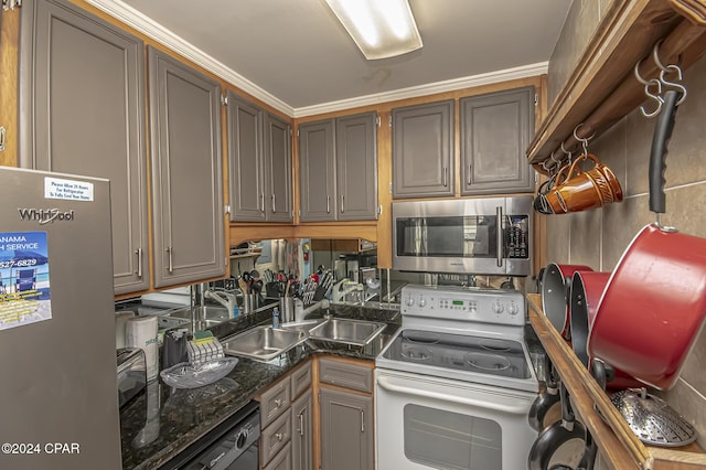 kitchen with refrigerator, ornamental molding, white electric range oven, sink, and dishwasher