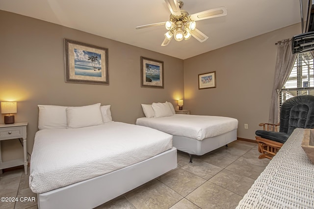 bedroom with light tile patterned floors and ceiling fan