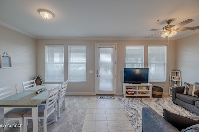 tiled living room with crown molding and ceiling fan