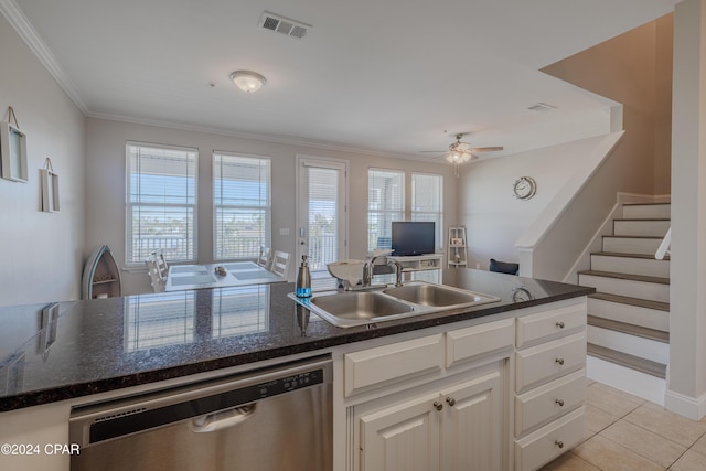 kitchen featuring stainless steel dishwasher, ceiling fan, sink, light tile patterned floors, and white cabinets