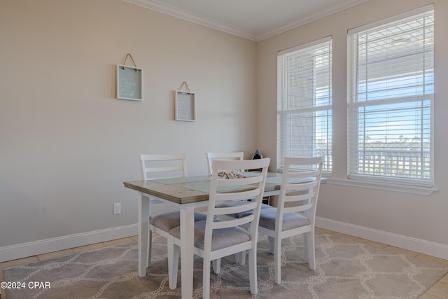 tiled dining area with ornamental molding