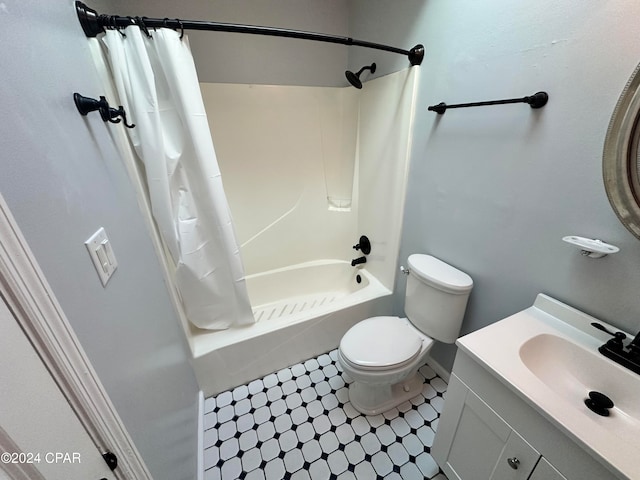 full bathroom with shower / bath combo, vanity, toilet, and tile patterned floors