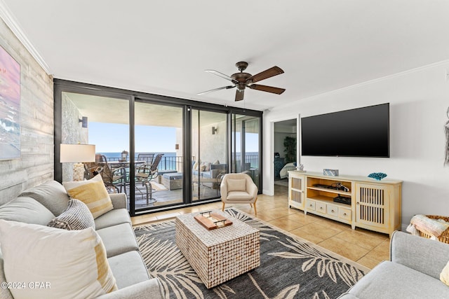 6201 Thomas Dr Unit 1606, Panama City Beach, FL 32408 - living area with tile patterned floors, ceiling fan, crown molding, and floor to ceiling windows