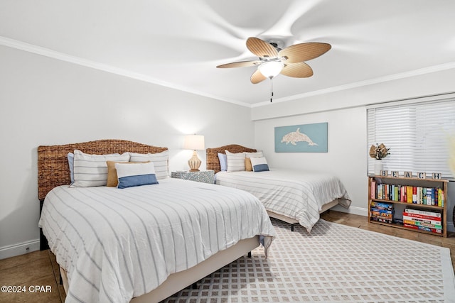 bedroom featuring ceiling fan and crown molding