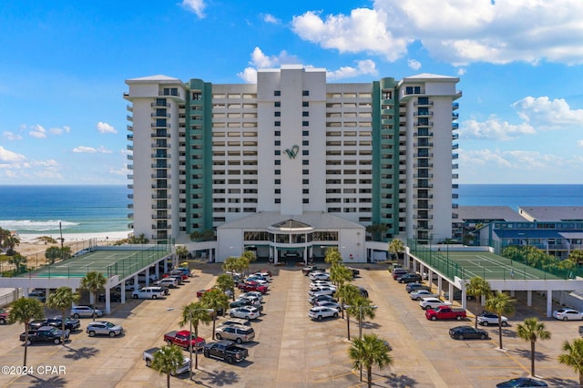 6201 Thomas Dr Unit 1606, Panama City Beach, FL 32408 - view of apartment building / complex with uncovered parking and a water view