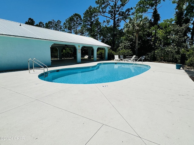 view of pool with a patio area