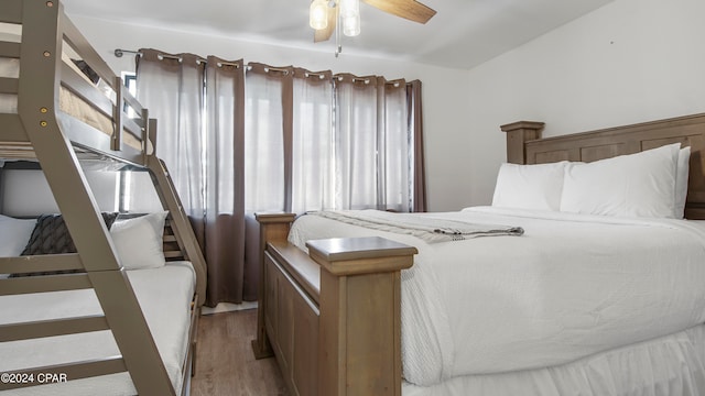 bedroom featuring ceiling fan and light hardwood / wood-style floors