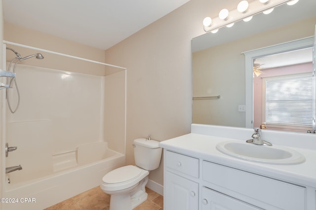 full bathroom featuring vanity,  shower combination, ceiling fan, tile patterned flooring, and toilet