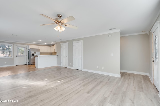 unfurnished living room featuring crown molding, light hardwood / wood-style flooring, and ceiling fan