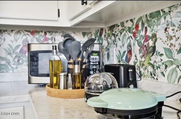 interior space with white cabinetry