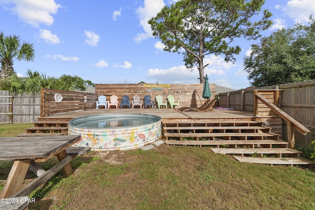 view of yard featuring a pool side deck