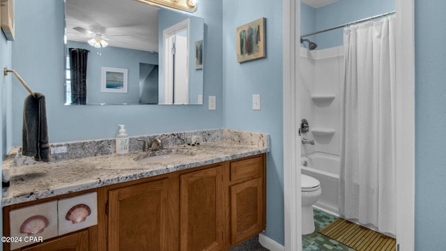 full bathroom with vanity, tile patterned floors, shower / bath combination with curtain, ceiling fan, and toilet