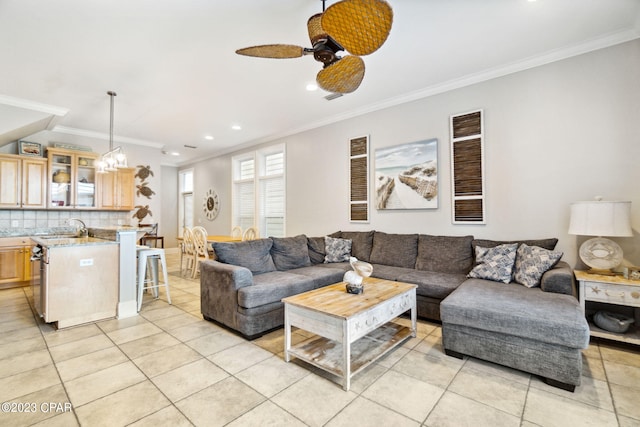 living room featuring ceiling fan, crown molding, and light tile patterned flooring