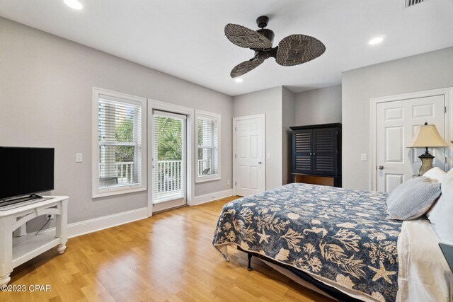 bedroom featuring ceiling fan, access to exterior, and light wood-type flooring