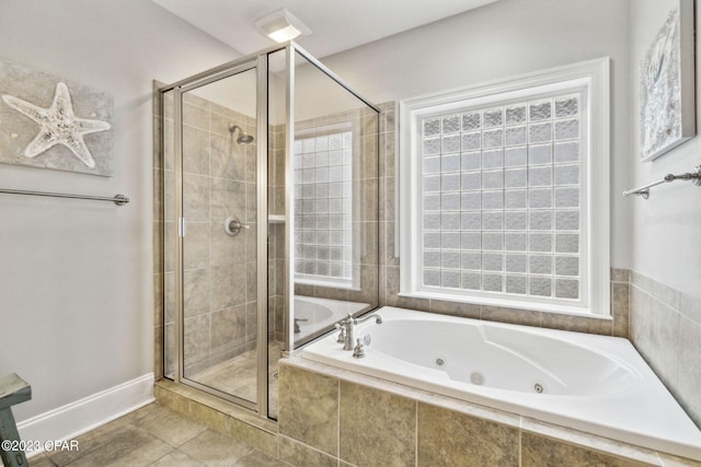 bathroom with shower with separate bathtub, tile patterned floors, and plenty of natural light