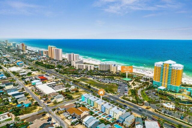 drone / aerial view with a view of the beach and a water view