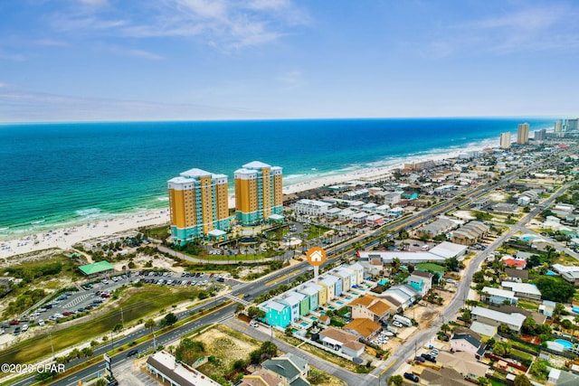 bird's eye view with a view of the beach and a water view