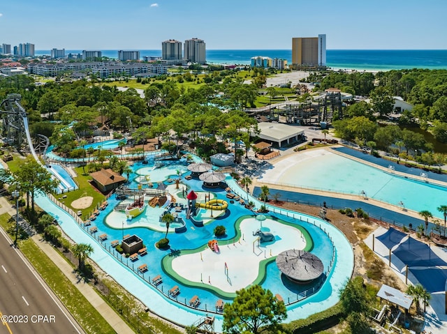 birds eye view of property with a water view