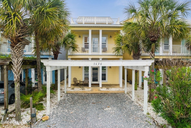 coastal home with a balcony