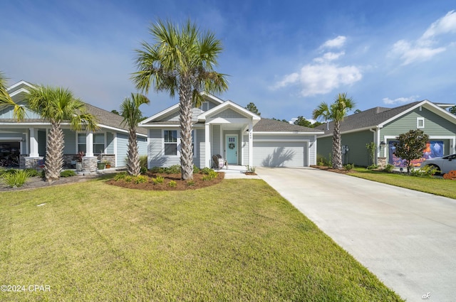 view of front facade featuring a front yard and a garage