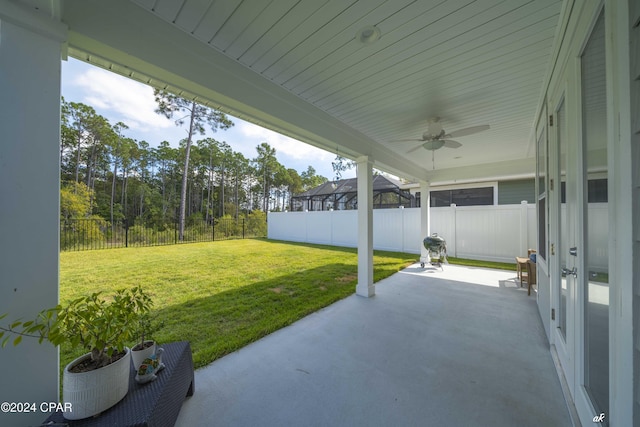 view of patio / terrace featuring ceiling fan