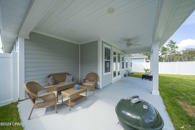 view of patio / terrace featuring ceiling fan