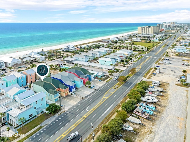 bird's eye view with a beach view and a water view