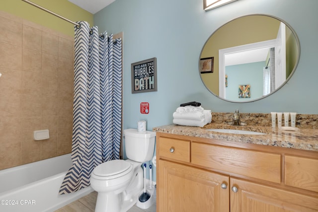 full bathroom with vanity, tile patterned floors, toilet, and shower / tub combo with curtain