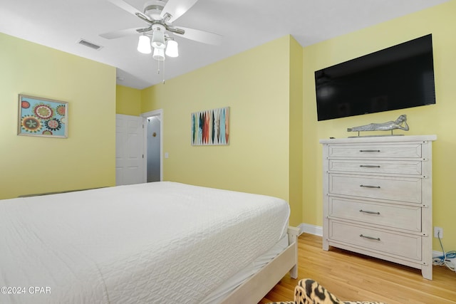 bedroom featuring ceiling fan and light wood-type flooring