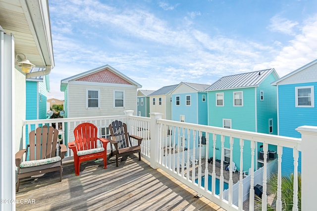 wooden balcony featuring a deck