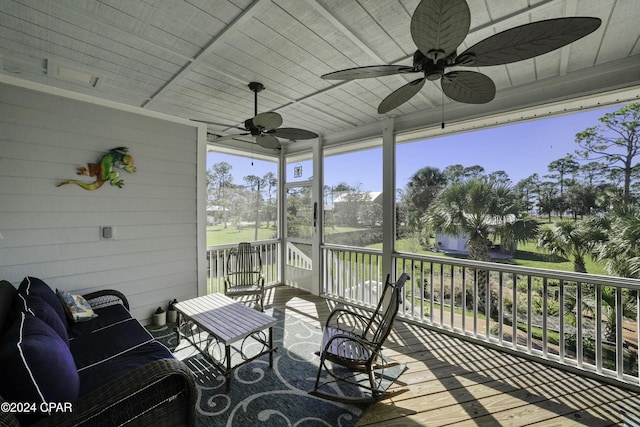 exterior space featuring ceiling fan