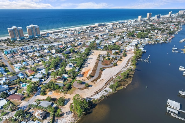 birds eye view of property featuring a water view