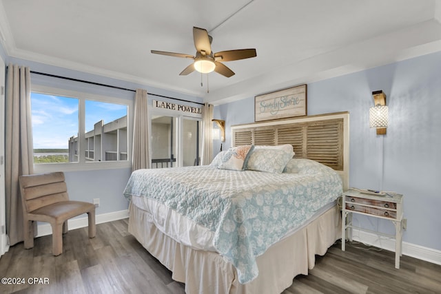 bedroom with ceiling fan, dark hardwood / wood-style flooring, and crown molding