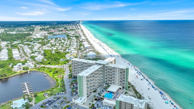 aerial view featuring a view of the beach and a water view